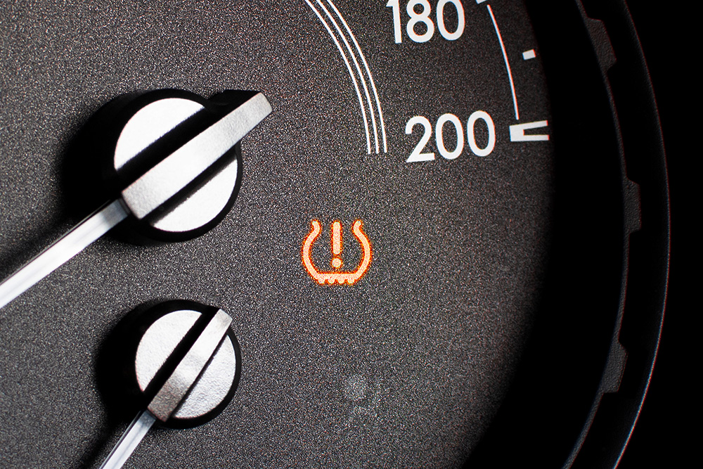 close-up of the speedometer, specifically, the tire pressure warning light
